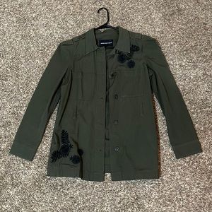 Utility jacket with embellishment